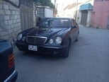 Mercedes E 230-3