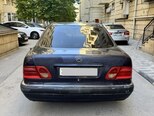 Mercedes E 230-4