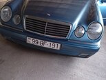 Mercedes E 280-1