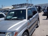 Mitsubishi Pajero io-5