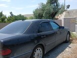 Mercedes E 200-4