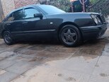 Mercedes E 230-11