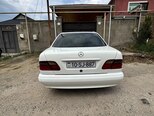 Mercedes E 230-4