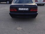 Mercedes E 230-4