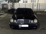 Mercedes E 230-9