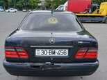 Mercedes E 230-4