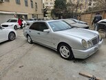 Mercedes E 230-3