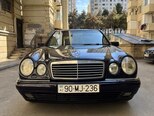 Mercedes E 230-1
