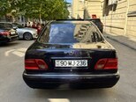 Mercedes E 230-4