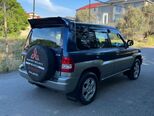 Mitsubishi Pajero io-4