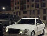Mercedes E 230-4