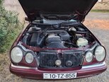 Mercedes E 230-11