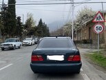 Mercedes E 230-7